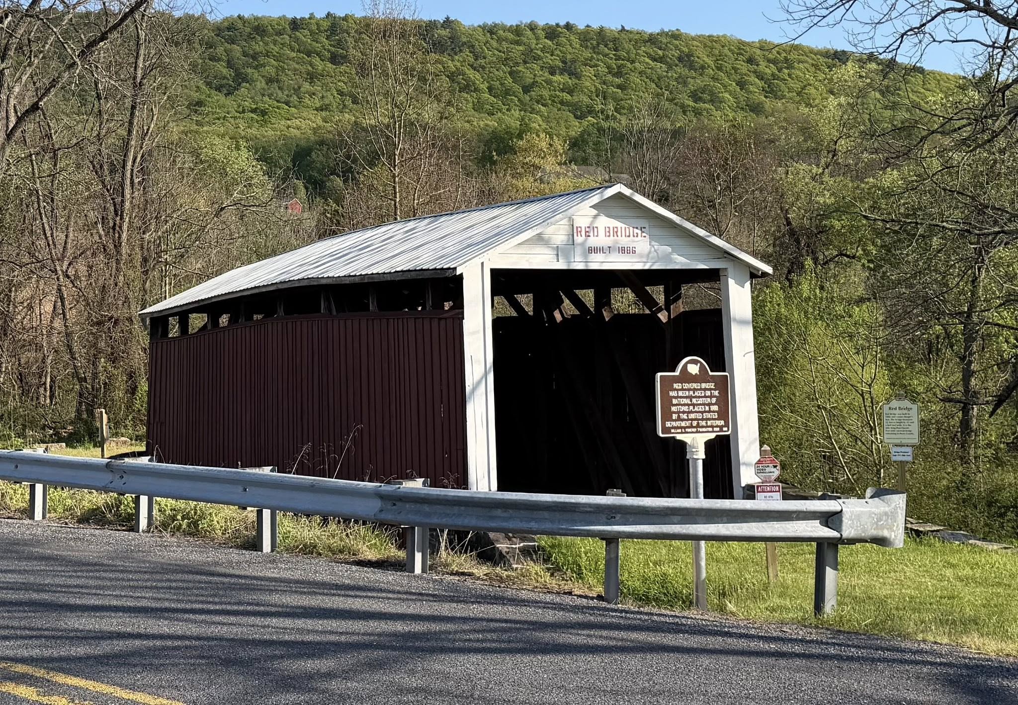 Red Covered Bridge built 1886 with William G. Pomeroy Foundation National Register historic marker, Perry County, Pennsylvania